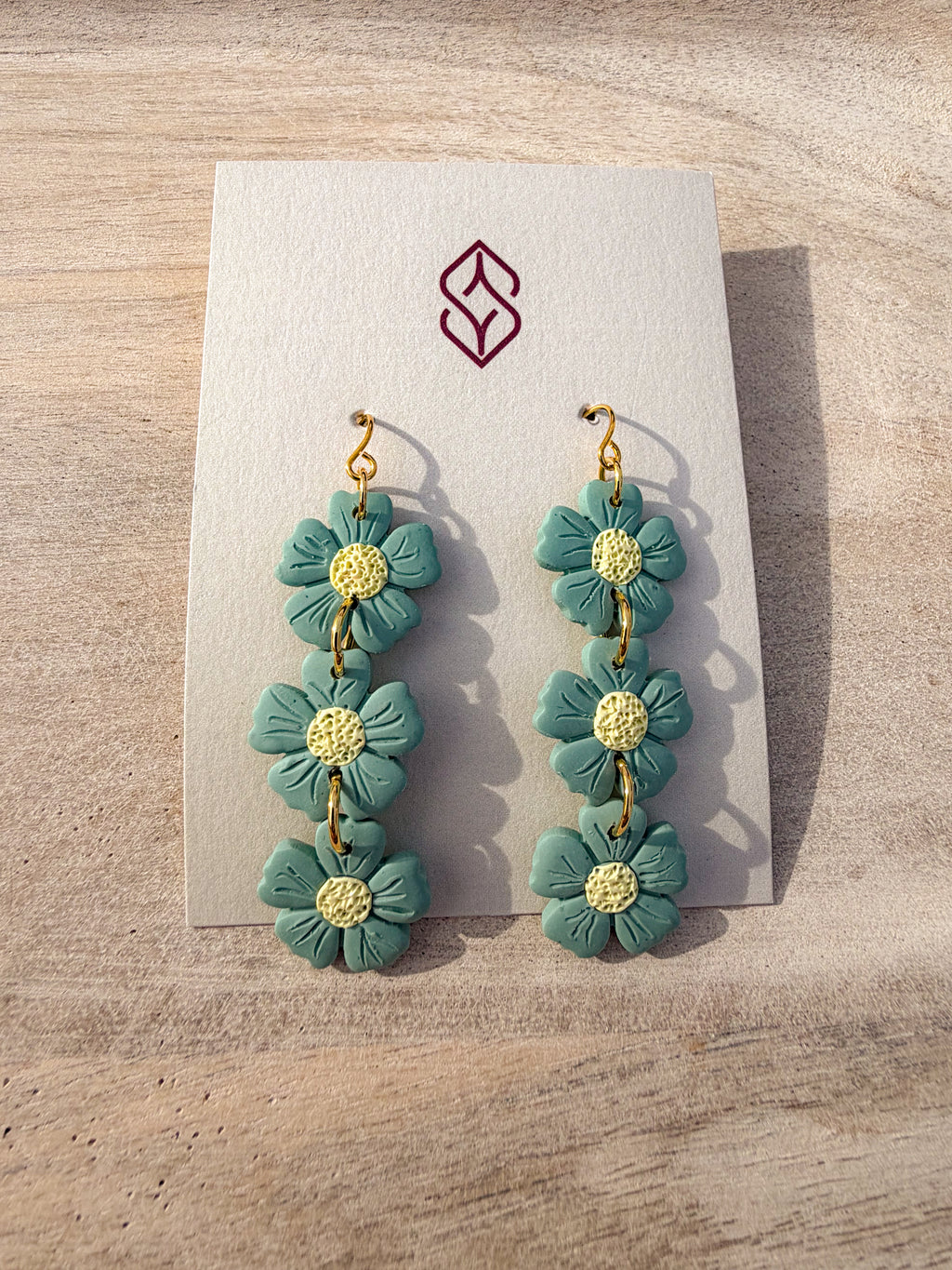 Three-flower dangle earring