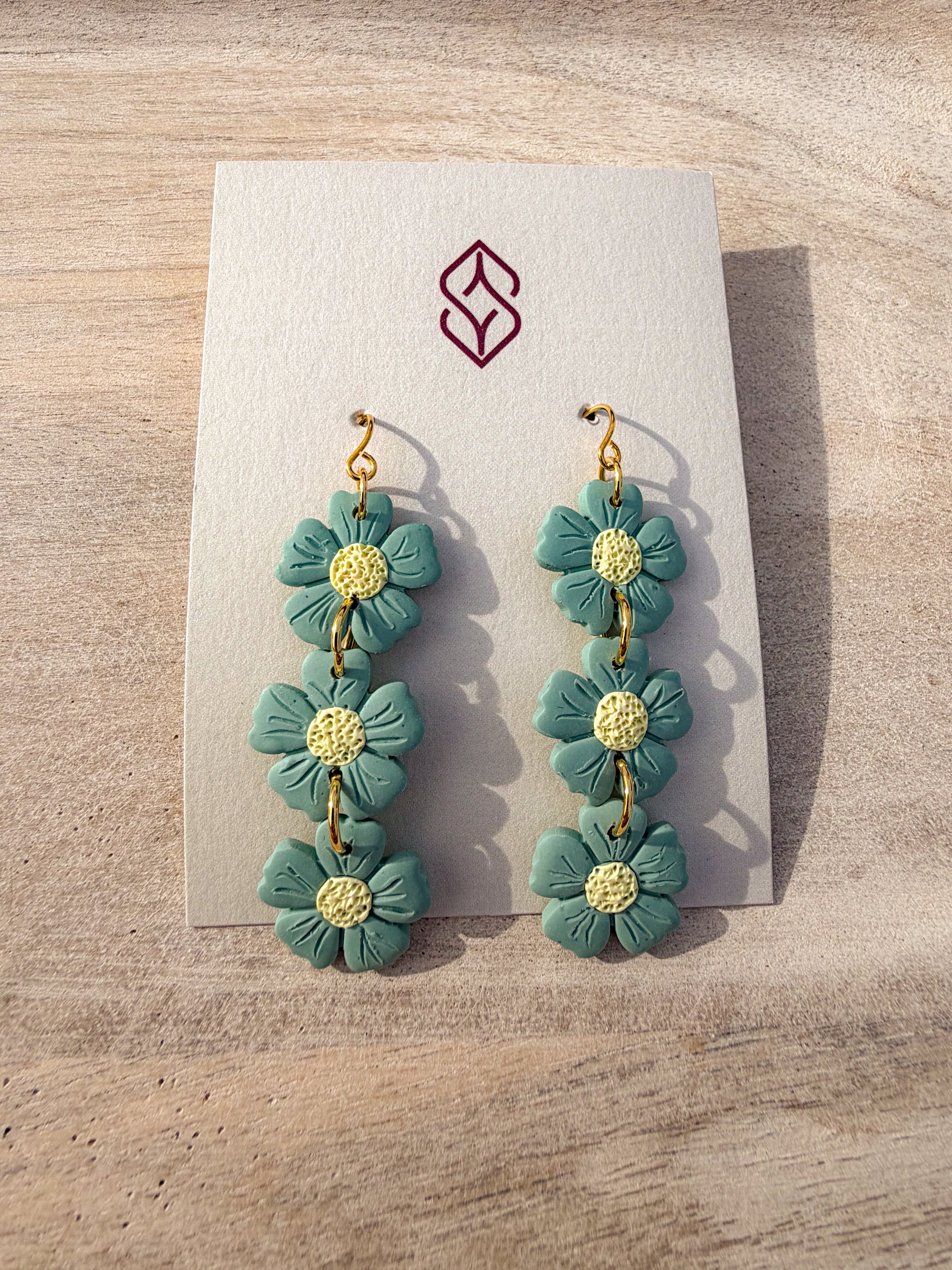 Three-flower dangle earring